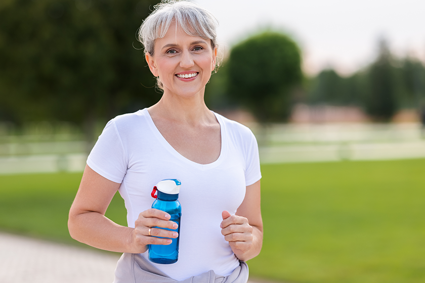 Portrait of happy positive mature woman with broad smile